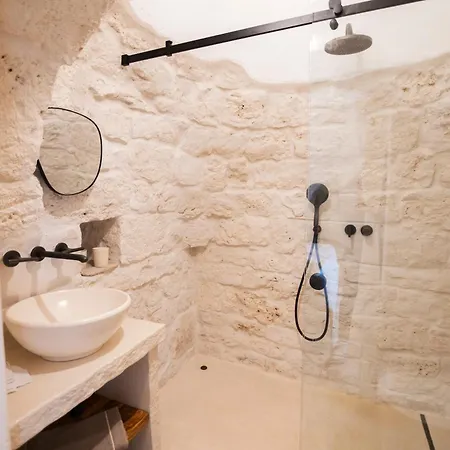 Trullo Nido Con Piscina In Comune 게스트하우스